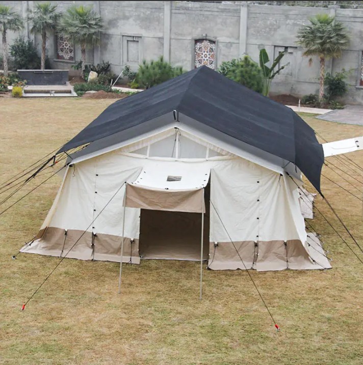 Heavy duty military style relief tent with dark fly and canvas walls